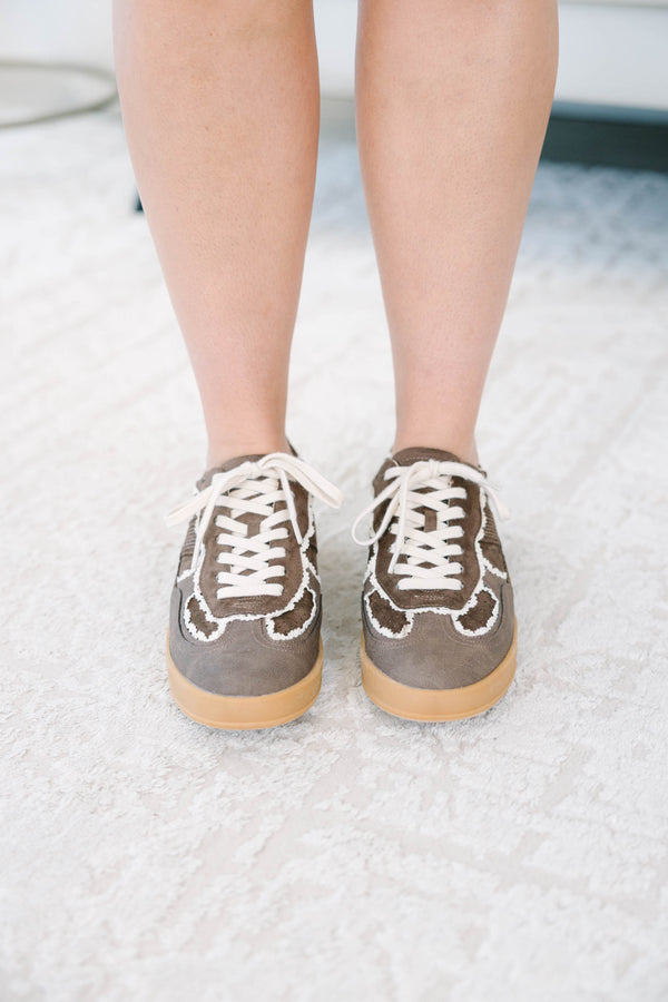 Plus size brown suede sneakers with white frayed trim, gum soles, and lace-up front.