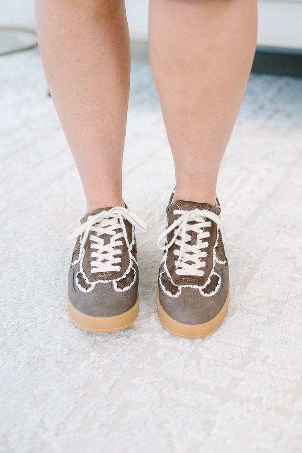 Plus size brown suede sneakers with white frayed trim, gum soles, and lace-up front.