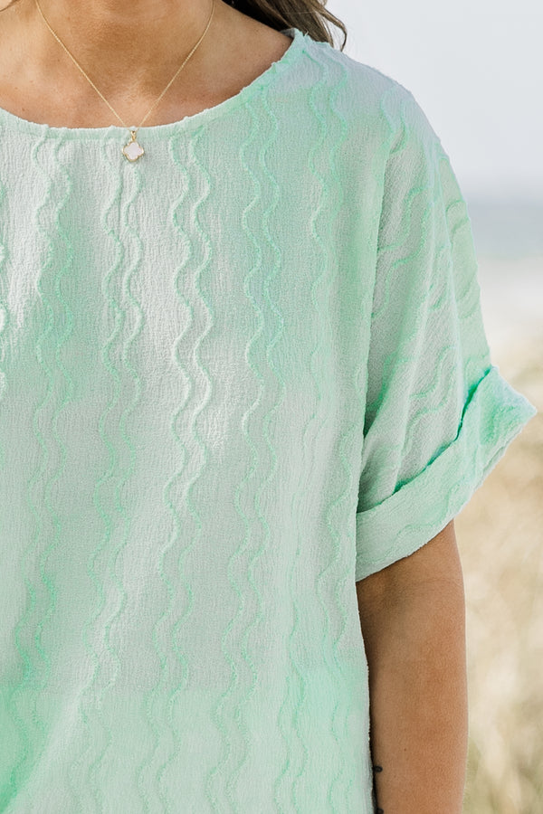 Chic Soul plus size clothing, mint green top with subtle vertical wavy line texture and rolled hem short sleeves
