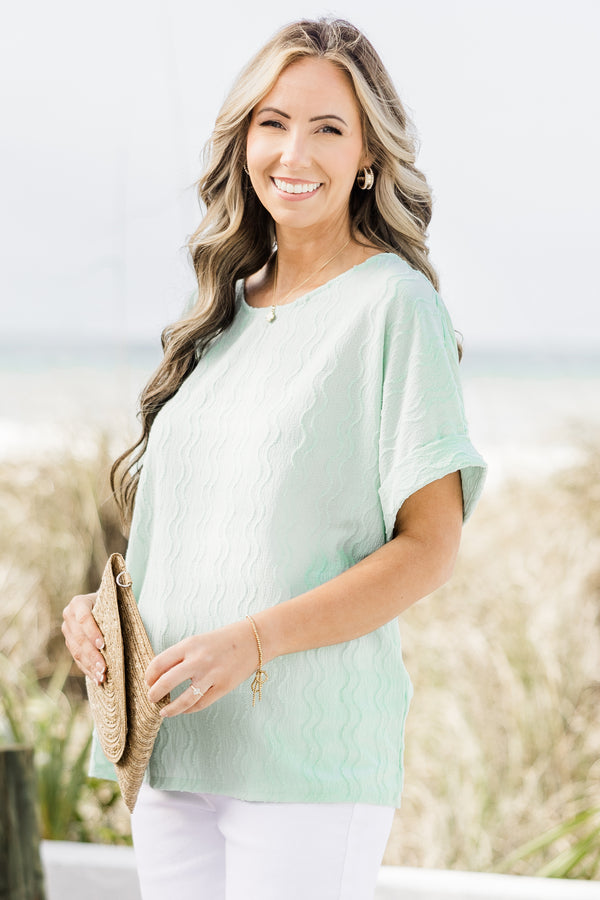 Chic Soul plus size clothing, mint green top with subtle vertical wavy line texture and rolled hem short sleeves