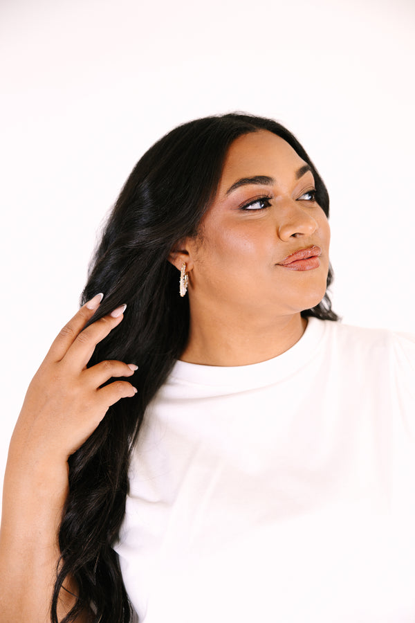 Chic Soul plus size clothing, white hoop with a woven look and gold beads outlining the the inside and outside of the hoop 
