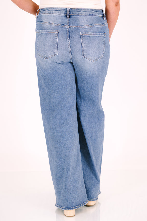 Plus Size high-rise wide-leg jeans in a medium wash denim.
