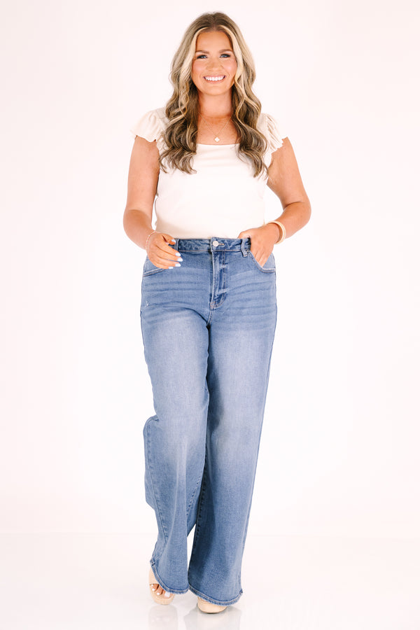 Plus Size high-rise wide-leg jeans in a medium wash denim.