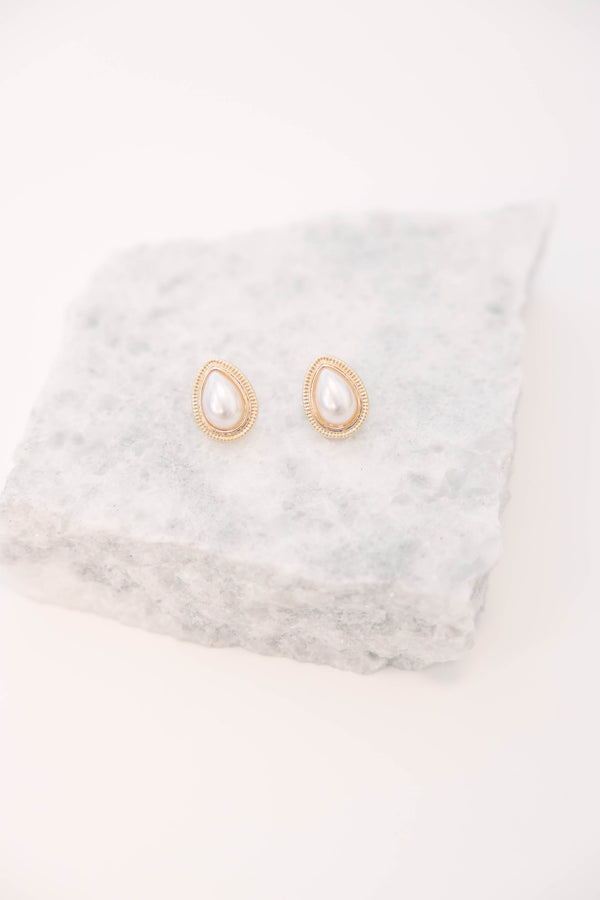Plus Size teardrop-shaped cream pearl stud earrings with a textured gold-tone border.