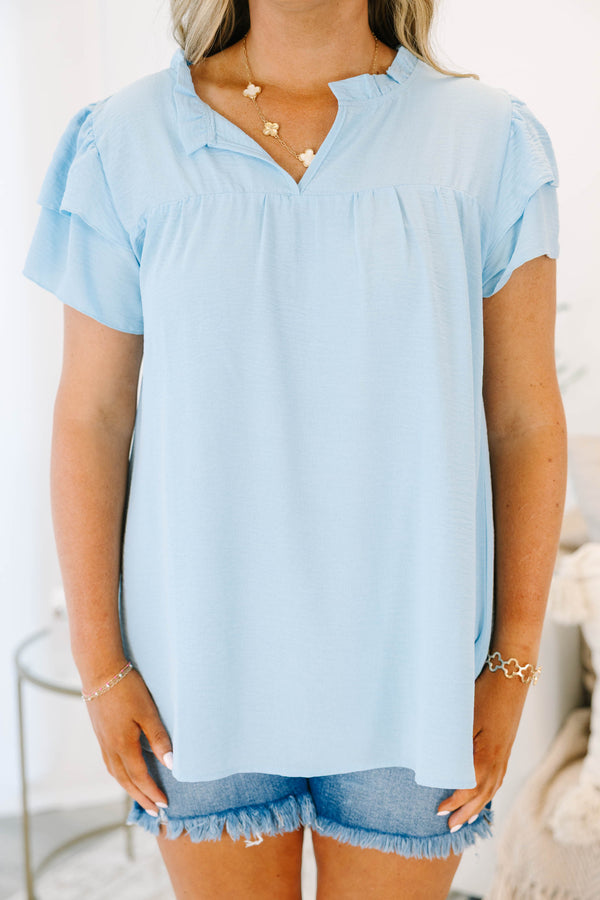 Plus Size light blue short sleeve top with a split neckline and ruffled sleeves.