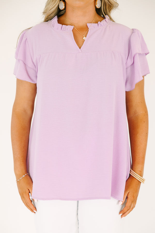 Plus Size purple short-sleeve top with a ruffled V-neckline and tiered flutter sleeves.