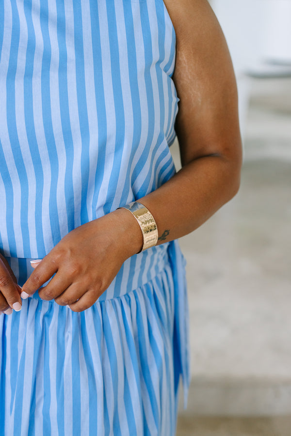 Plus Size hammered gold cuff bracelet with a wide band and textured finish.