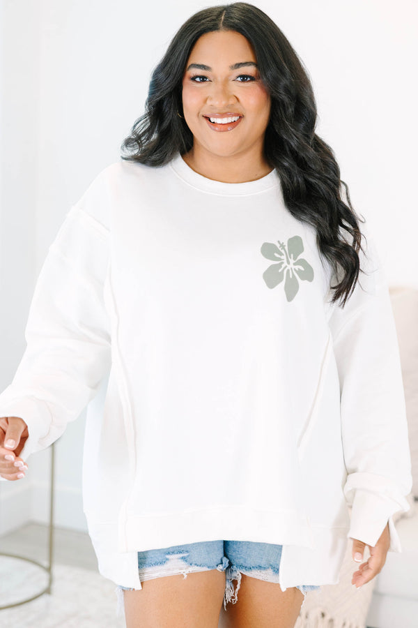 Plus Size ivory crewneck sweatshirt with a small sage green hibiscus flower on the chest.