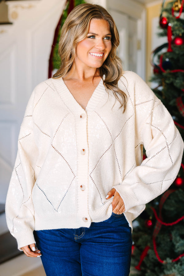 Plus Size cream sequin cardigan with a V-neck, button-front, and diamond pattern knit.