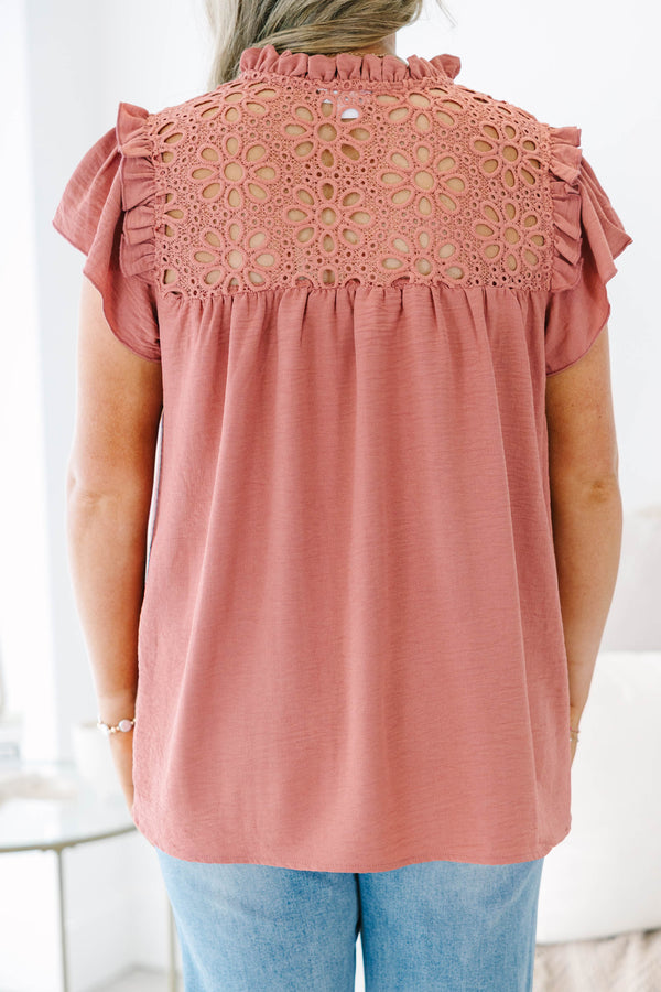 Plus Size pink top with eyelet lace yoke, ruffled neckline, and short flutter sleeves.