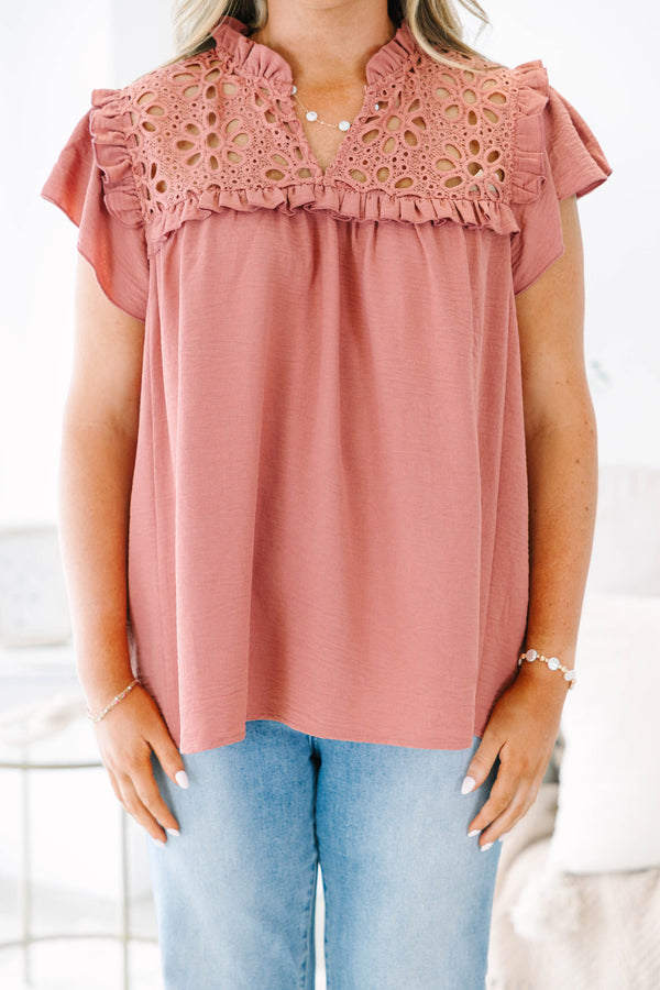Plus Size pink top with eyelet lace yoke, ruffled neckline, and short flutter sleeves.