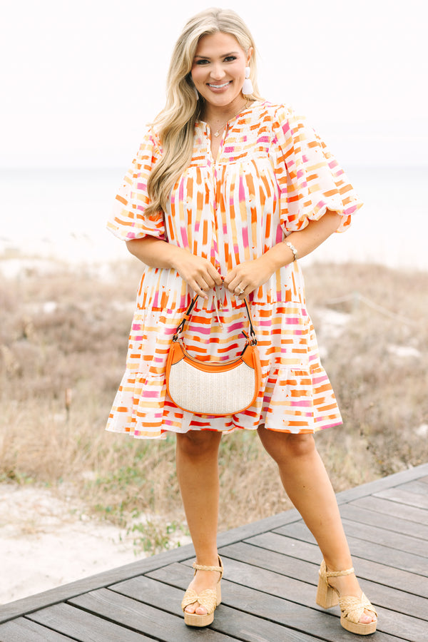 Chic Soul plus size clothing, orange and pink abstract stripe pattern short puff sleeve tiered baby doll dress with v neck cutout and rouching detailing on the top