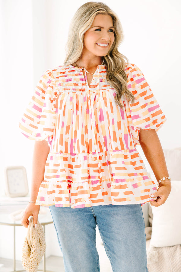 Chic Soul plus size clothing, orange abstract flowy short sleeve top with v neckline and smocked chest detail with large puff sleeves
