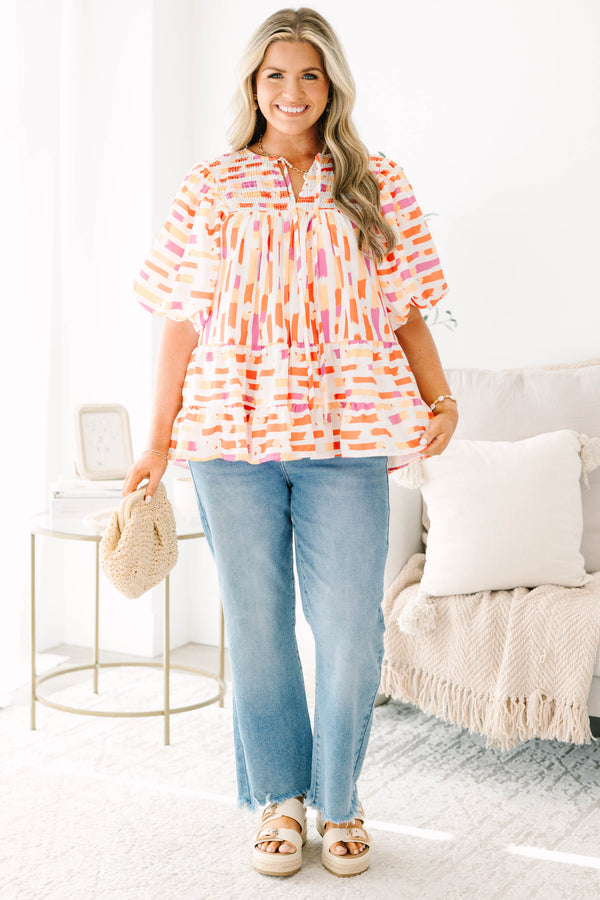 Chic Soul plus size clothing, orange abstract flowy short sleeve top with v neckline and smocked chest detail with large puff sleeves