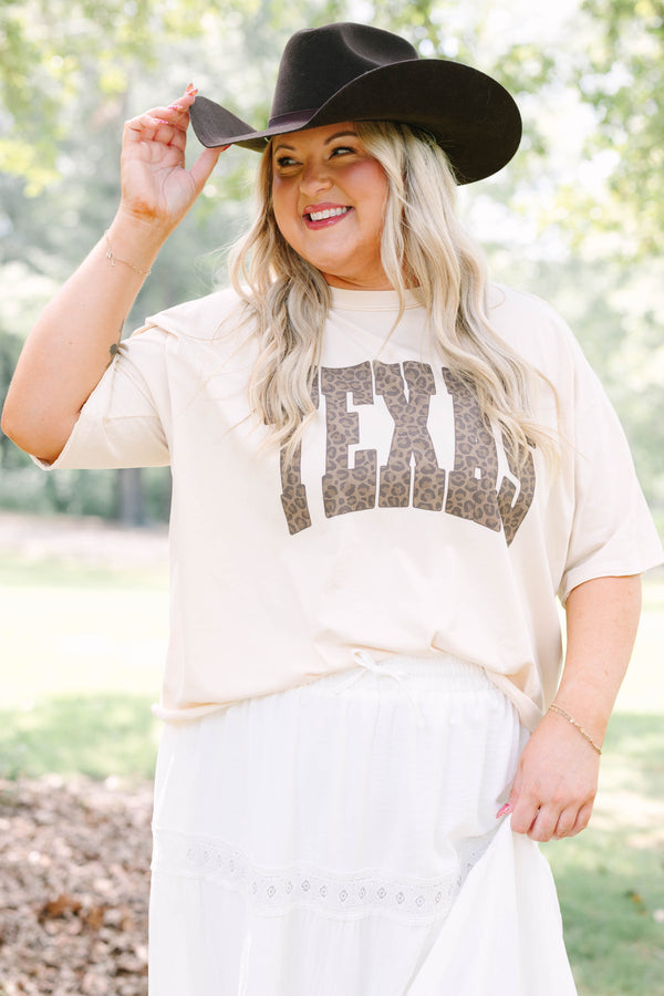 Plus Size sand vintage wash tee with leopard print Texas graphic and white tiered lace skirt.