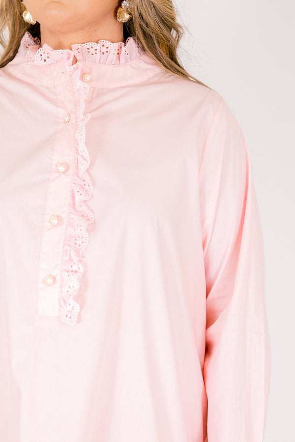 Chic Soul plus size clothing, pastel pink knee length long sleeve dress with a ruffle detail on the dress right above the knee as well as going down the v-neckline and buttons 