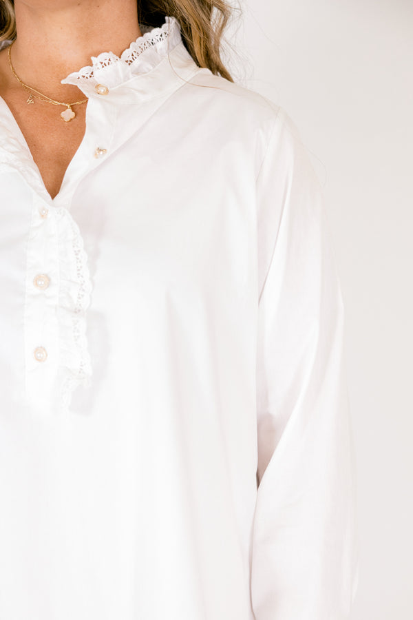 Chic Soul plus size clothing, white knee length dress with buttons going down to the chest as well as a lace ruffle detail on the collar and the button-up section 