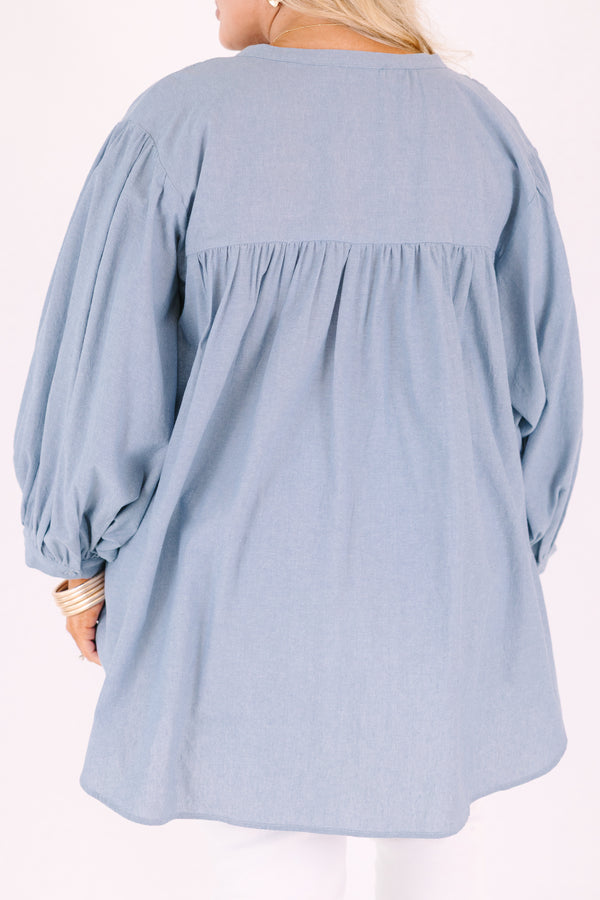 Chic soul plus size clothing, chambray button-up top with long sleeves that have cuffs at the end of each sleeve 
