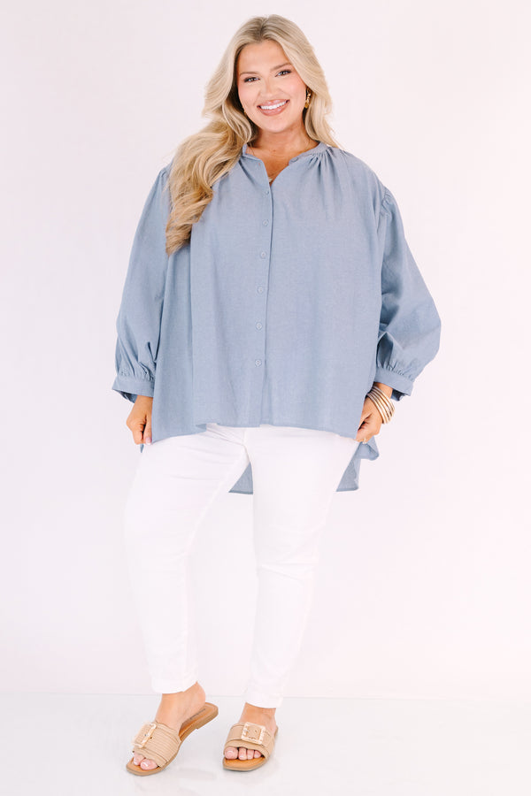 Chic soul plus size clothing, chambray button-up top with long sleeves that have cuffs at the end of each sleeve 
