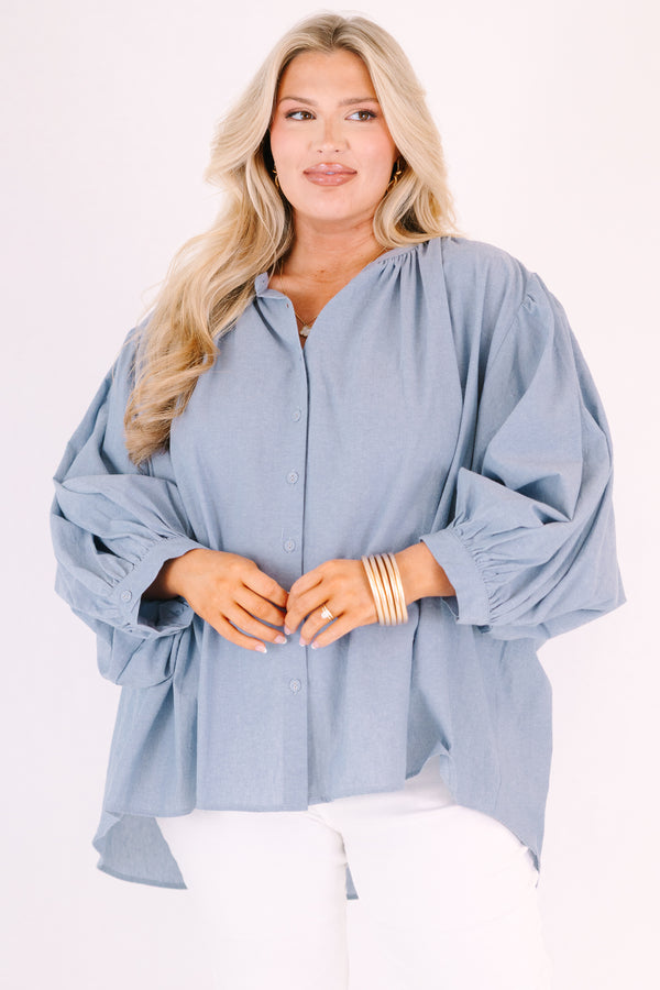 Chic soul plus size clothing, chambray button-up top with long sleeves that have cuffs at the end of each sleeve 
 