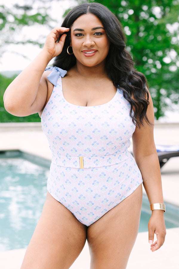 Chic Soul Plus Size Clothing, a blue floral print one-piece swimsuit with bows at the top of the tank style sleeves and a belt with a golden clasp