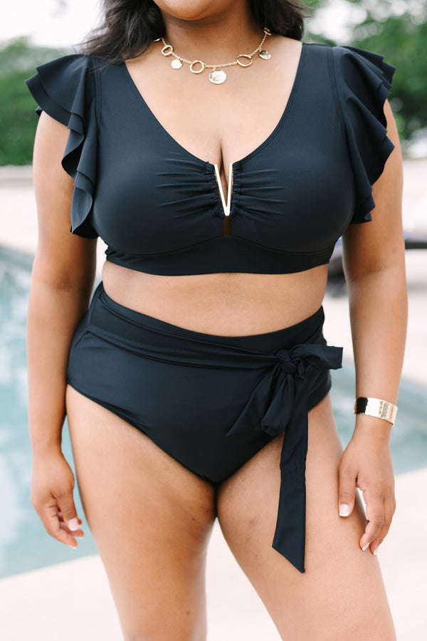 Chic Soul Plus Size Clothing, a black swim top with a gold V detail at center bust and ruffle sleeves