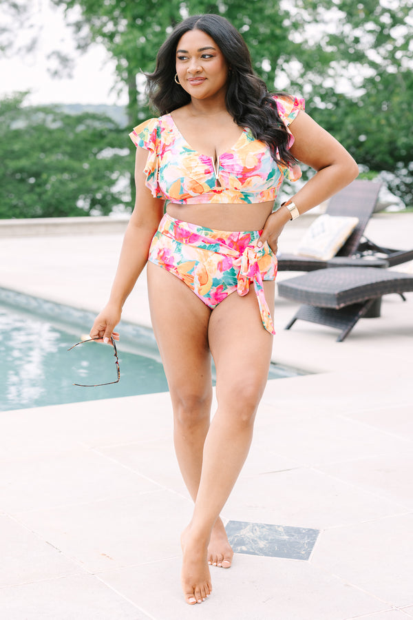 Chic Soul Plus Size Clothing, a pink, green, orange, and white water color floral print swim bottom with a bow belt detail