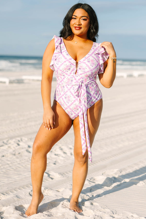 Chic Soul plus size clothing, purple floral one piece with flutter sleeves and a belt that ties into a bow around the waist as well as a v cut out that has a gold detail