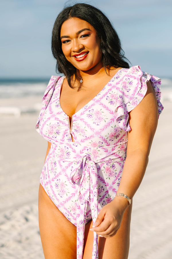 Chic Soul plus size clothing, purple floral one piece with flutter sleeves and a belt that ties into a bow around the waist as well as a v cut out that has a gold detail