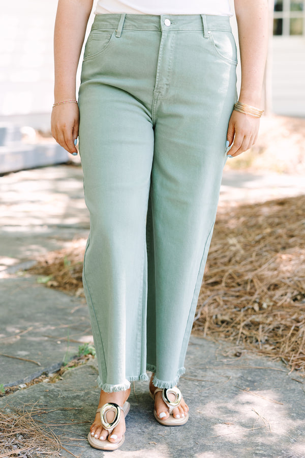 Chic Soul plus size clothing, sage green jeans with raw frayed hemline and functional pockets