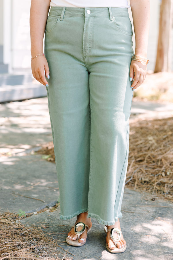 Chic Soul plus size clothing, sage green jeans with raw frayed hemline and functional pockets