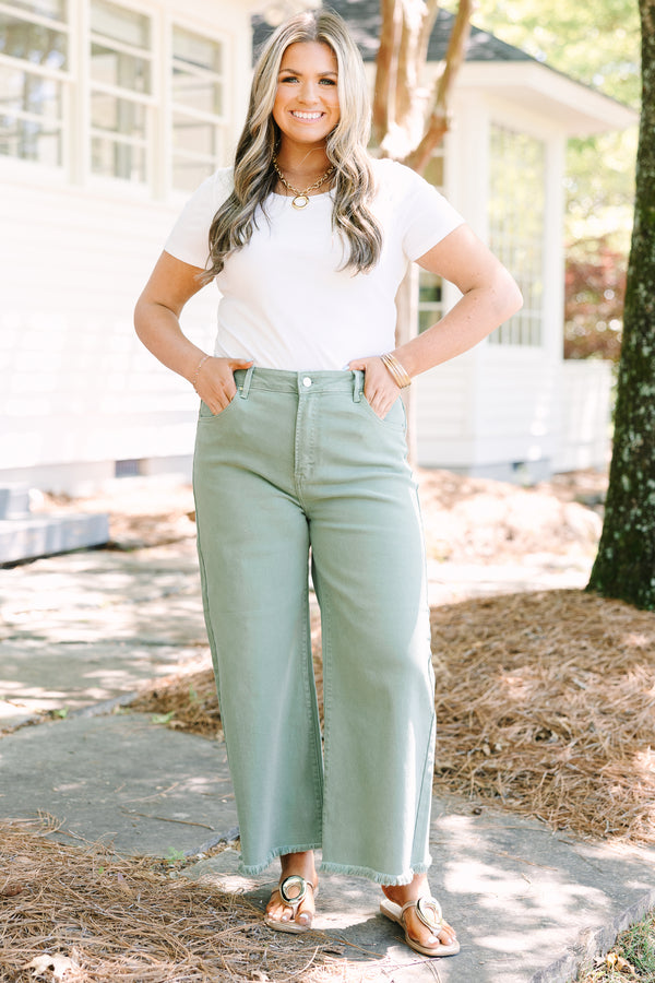 Chic Soul plus size clothing, sage green jeans with raw frayed hemline and functional pockets