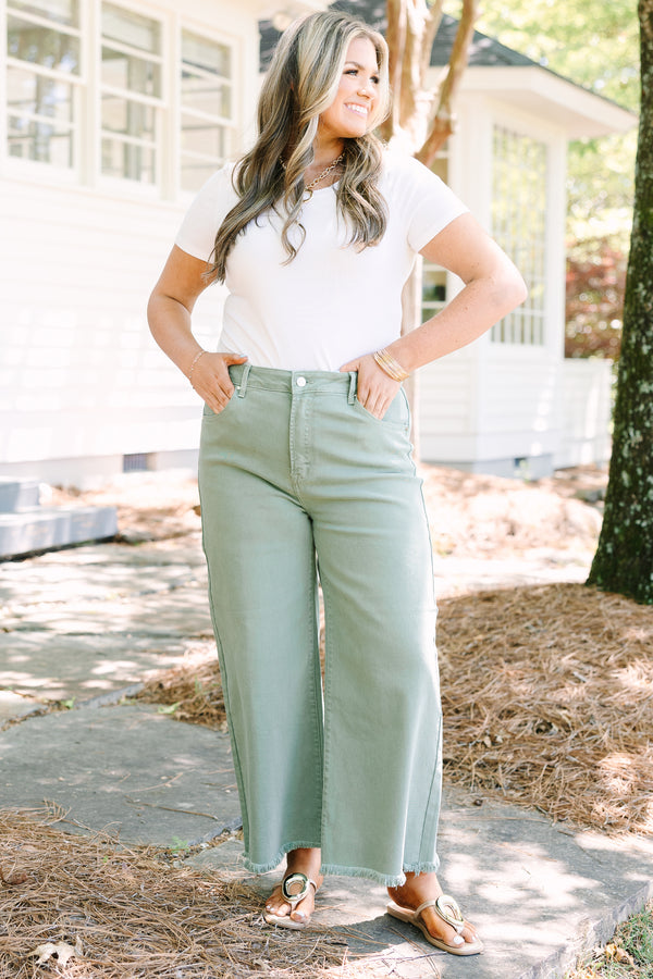 Chic Soul plus size clothing, sage green jeans with raw frayed hemline and functional pockets