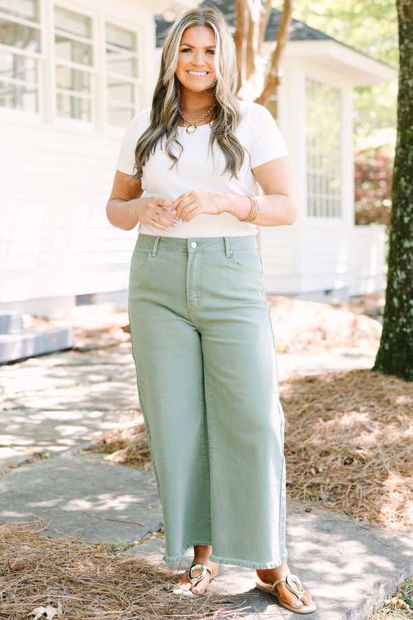 Chic Soul plus size clothing, sage green jeans with raw frayed hemline and functional pockets