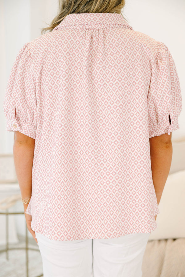 Plus Size pink and white geometric print top with puff sleeves, a collared neckline, and buttons.