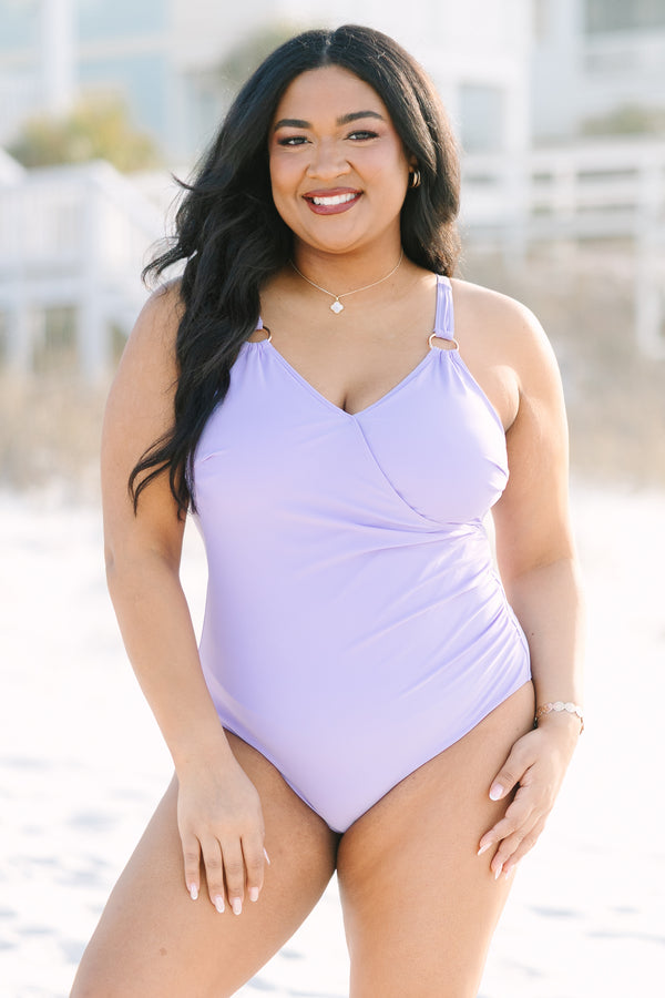 Chic Soul plus size clothing, purple one piece swimsuit with a deep v-neckline and gold ring details at the bottom of each strap