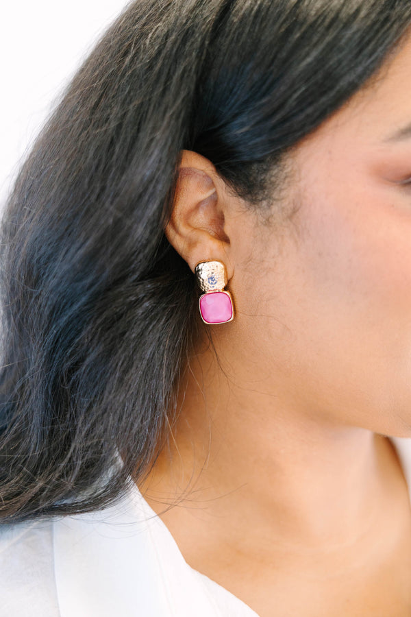 Plus Size gold-toned square stud earrings featuring textured metal and purple stone accents.