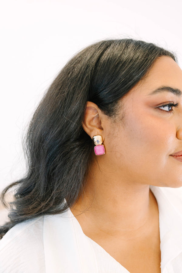 Plus Size gold-toned square stud earrings featuring textured metal and purple stone accents.