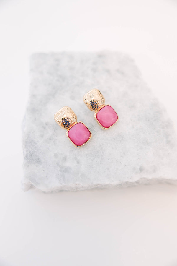 Plus Size gold-toned square stud earrings featuring textured metal and purple stone accents.