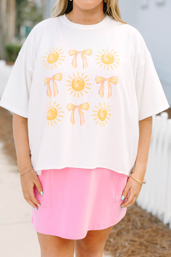 Chic Soul plus size clothing, white short sleeve boyfriend tee with yellow bows and sun graphics in rows on the front of the tee