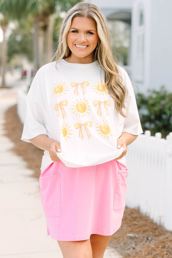 Chic Soul plus size clothing, white short sleeve boyfriend tee with yellow bows and sun graphics in rows on the front of the tee