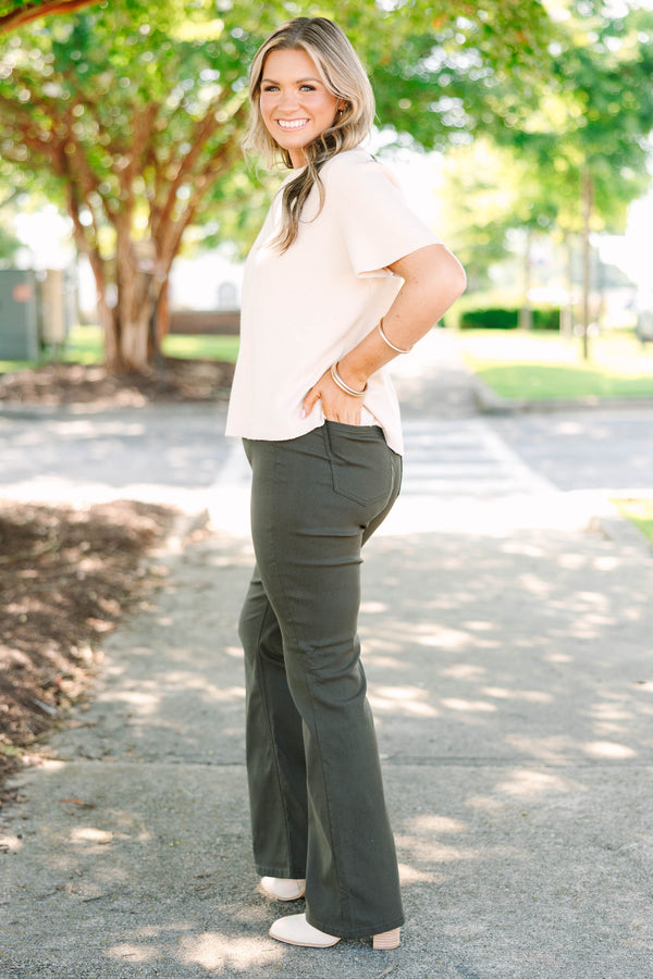Plus size dark olive flare jeans in a stretchy rayon blend with a high-waisted, flattering fit.