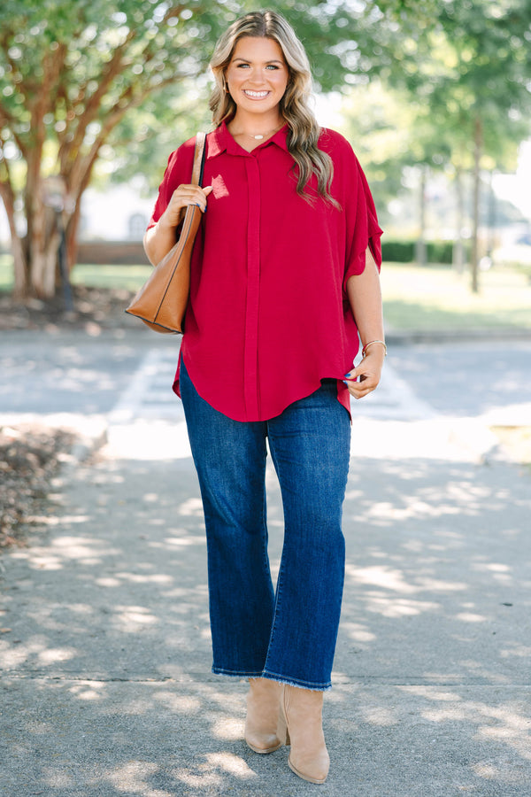 Plus size flowy wine red button-down top with a collared neck and drop shoulders.