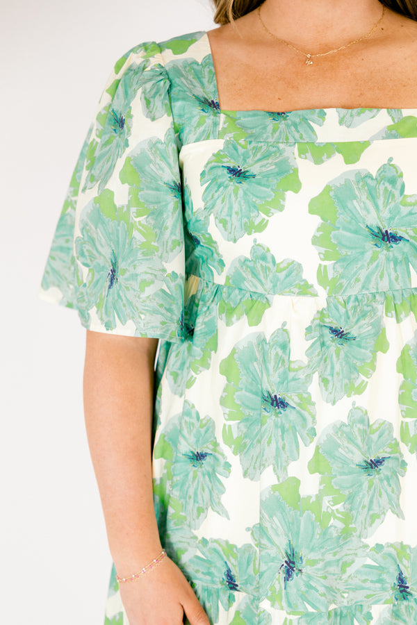 Chic Soul plus size clothing, green tiered maxi dress with short sleeves a square neckline and a green floral pattern throughout 
