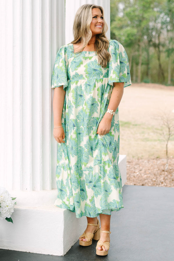Chic Soul plus size clothing, green tiered maxi dress with short sleeves a square neckline and a green floral pattern throughout 