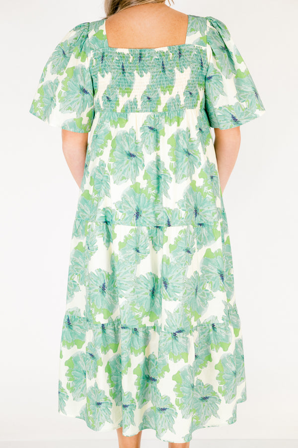 Chic Soul plus size clothing, green tiered maxi dress with short sleeves a square neckline and a green floral pattern throughout 
