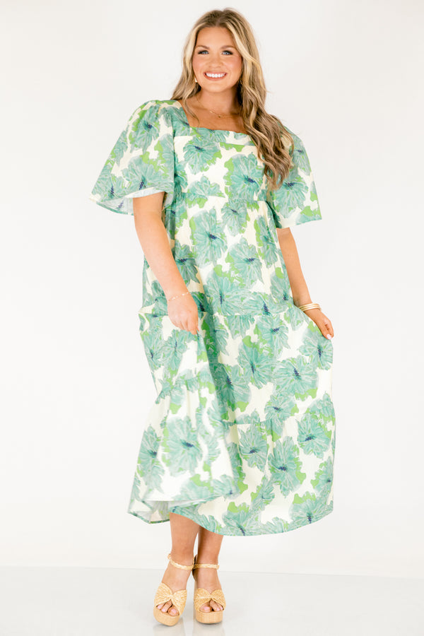 Chic Soul plus size clothing, green tiered maxi dress with short sleeves a square neckline and a green floral pattern throughout 
