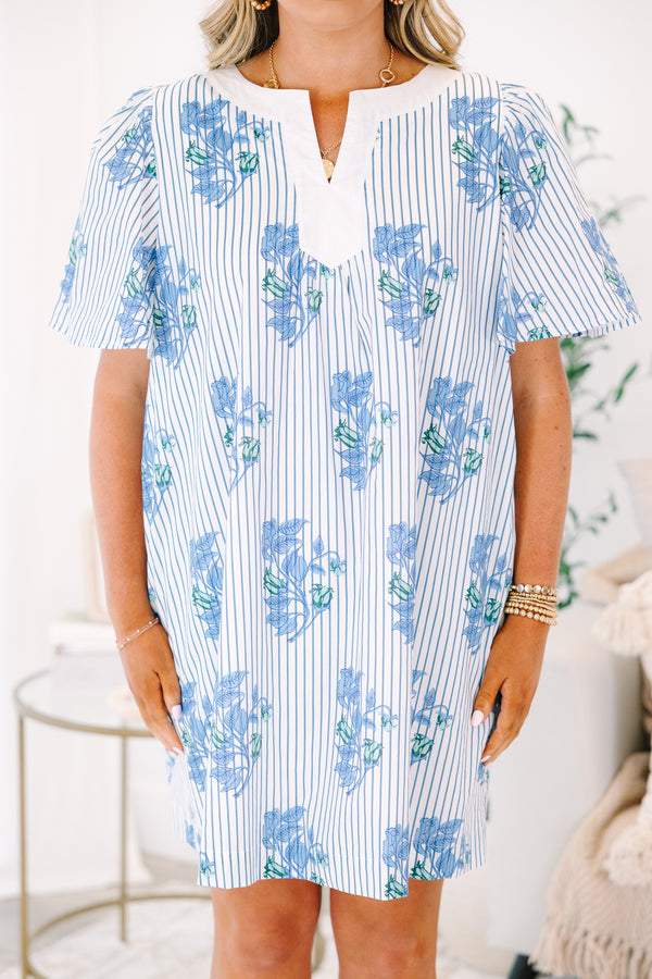 Plus Size blue and white striped shift dress with a floral print, V-neckline, and flutter sleeves.