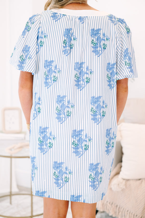 Plus Size blue and white striped shift dress with a floral print, V-neckline, and flutter sleeves.