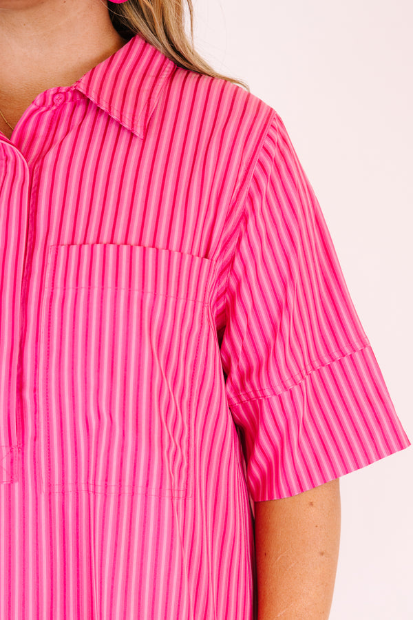 Chic Soul plus size clothing,  pink knee length dress with a ruffle detail on the bottom of the dress and buttons going down the middle of the dress to the bottom of the chest area as well has half sleeves and a dark pink striped pattern throughout 